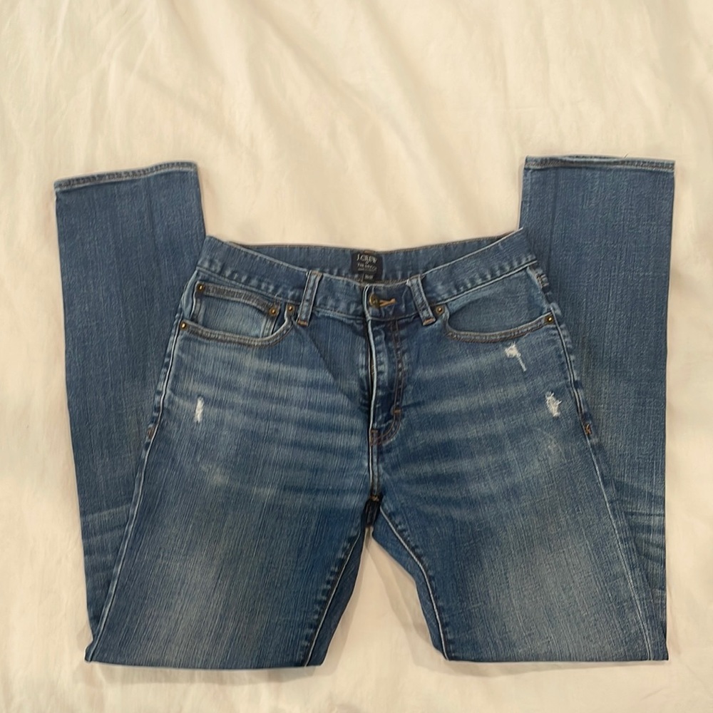 JCREW lighht wash faded jeans with rip detail